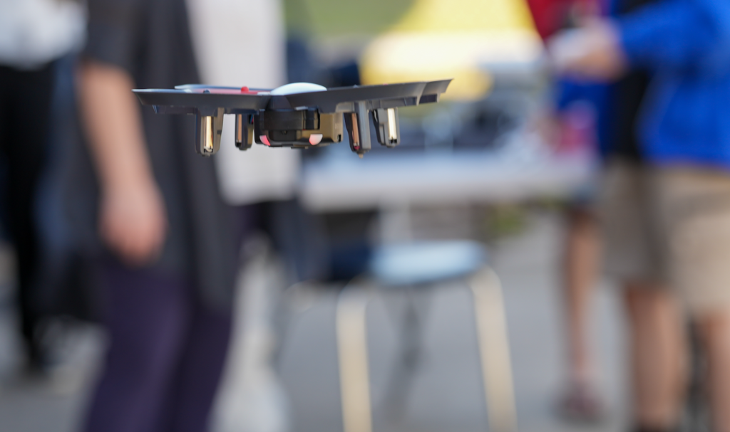 Close-up of a drone in flight during class