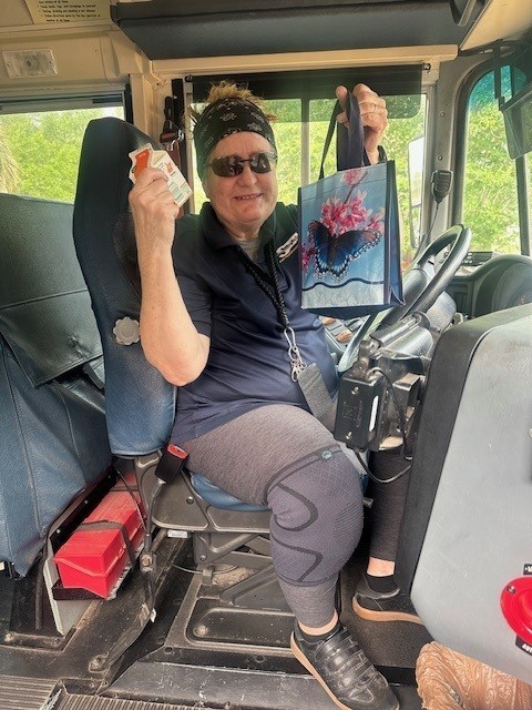 pictures of bus drivers sitting on the bus
