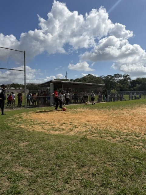 Ms. Neeley kicking for the Student team