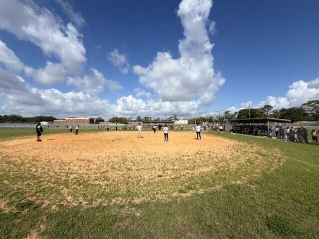 A great day for kickball with students versus staff