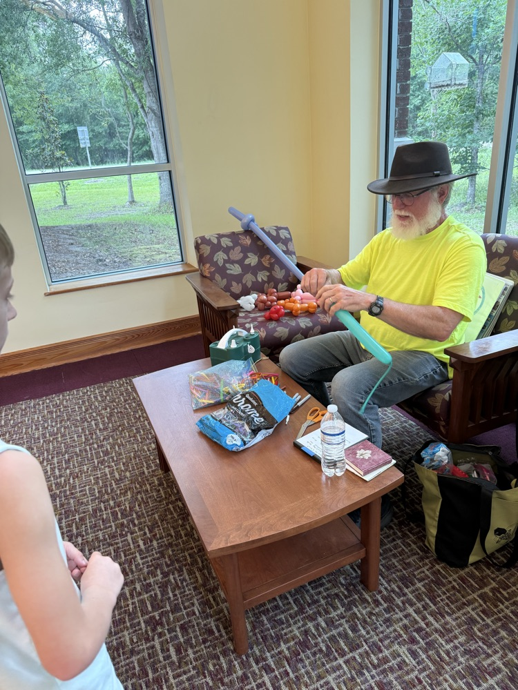 Families reading at library
