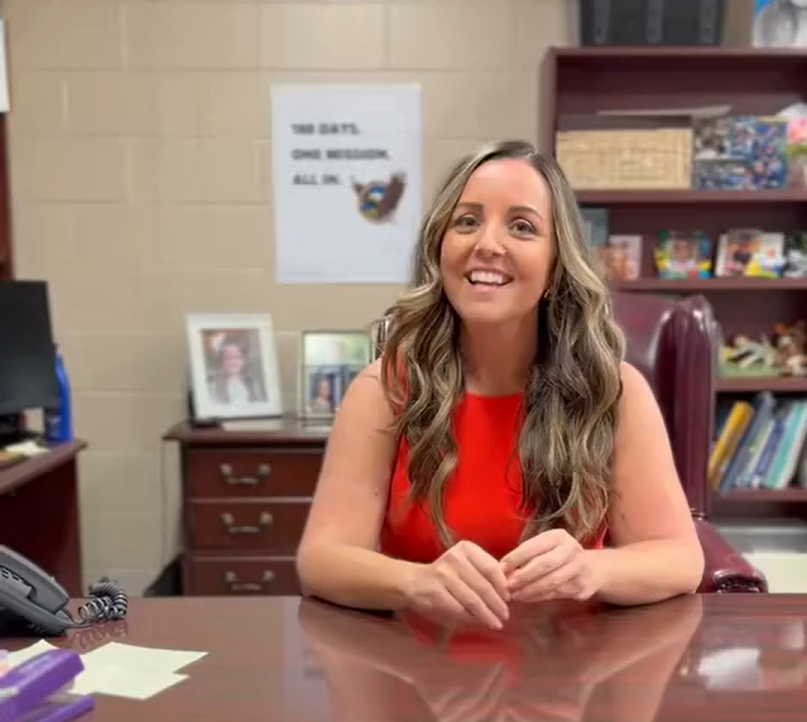 Principal Butterfield smiling at Mandarin Oaks Elementary school.