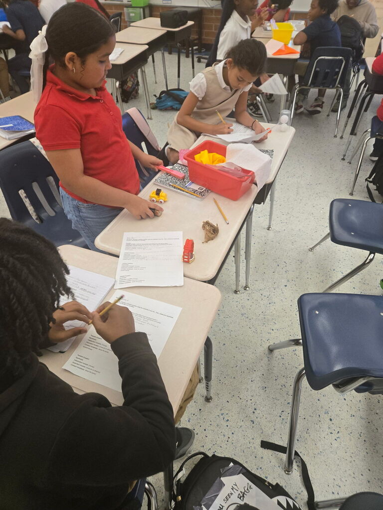 5th graders working from old fashioned bins when the wifi went out