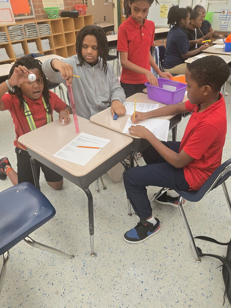 5th graders working from old fashioned bins when the wifi went out