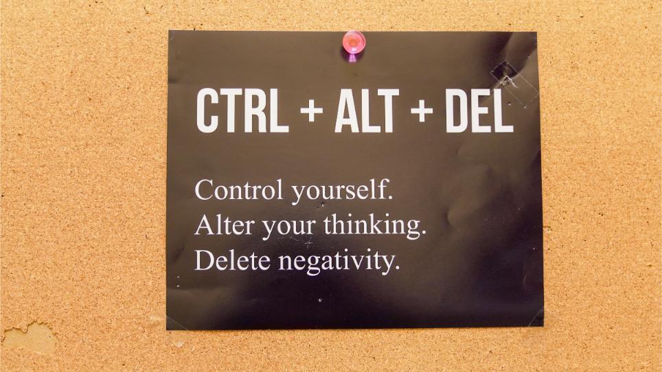 A motivational sign on a brown background reads "CTRL + ALT + DEL: Control yourself, Alter your thinking, Delete negativity."