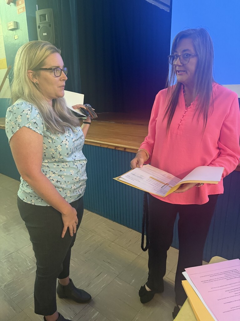Image of teacher and parent