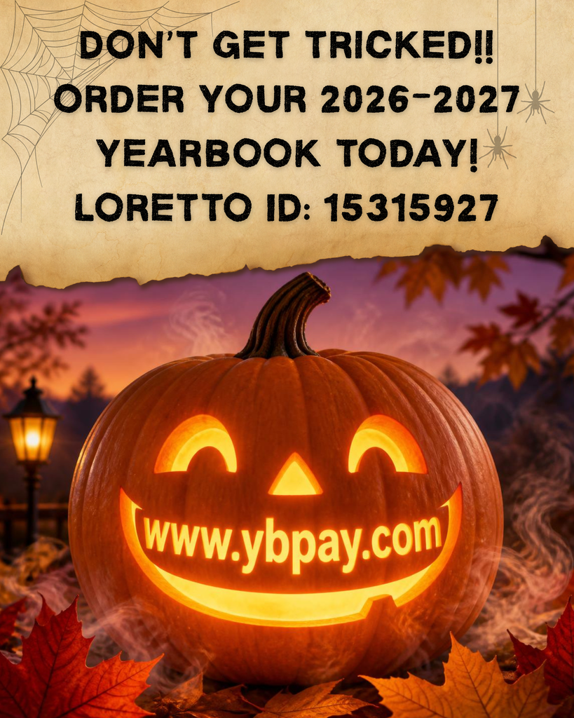 Pumpkin with a smiling face lit up in front of autumn leaves. A lamp post is visible in the background.
