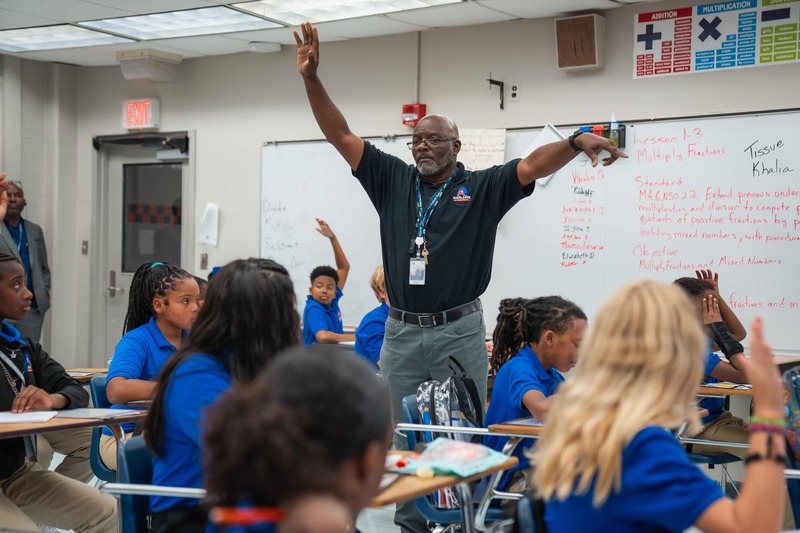 teacher standing in class
