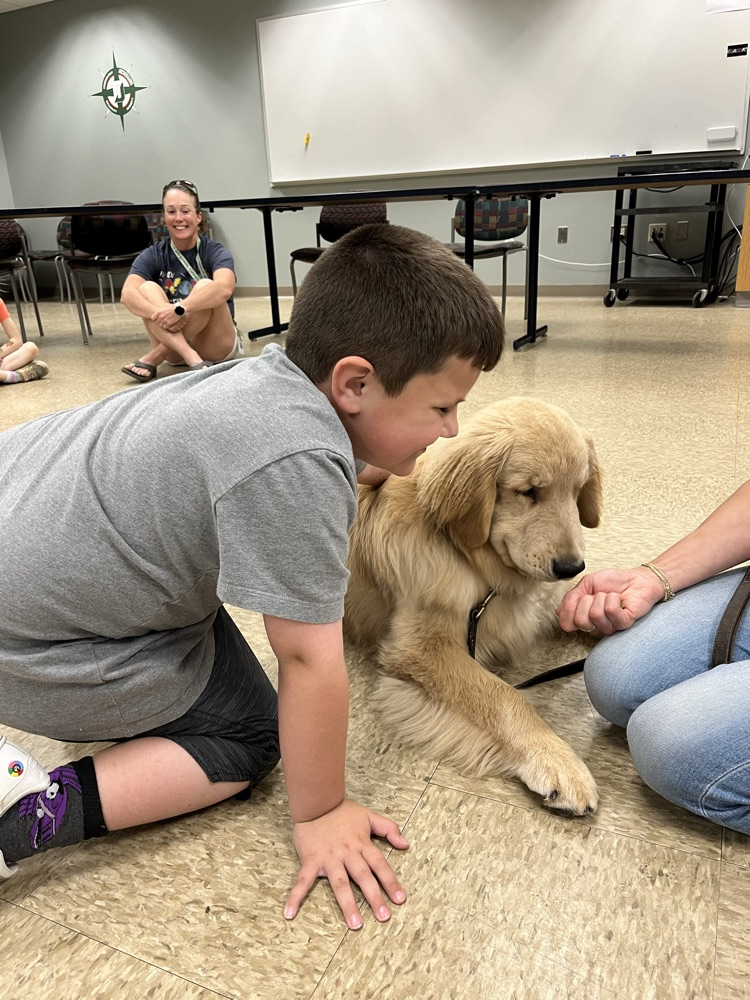 student with dog