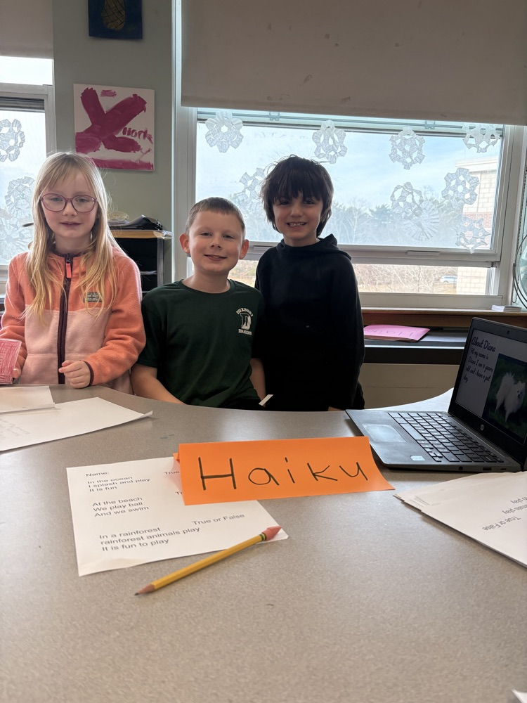 Alden students with their haiku poetry