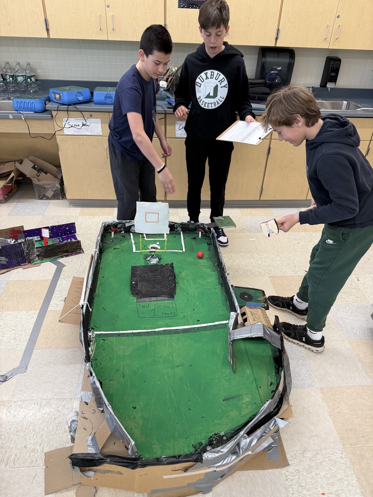 Students playing STEM mini-golf