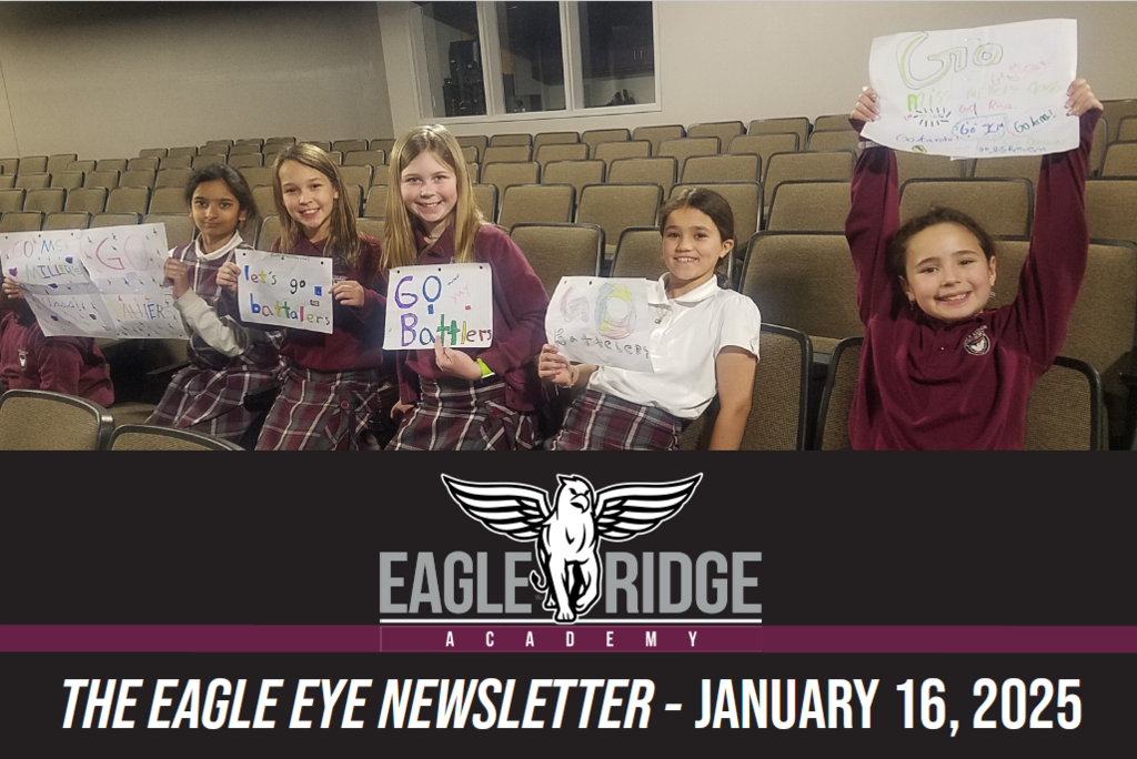 group og students holding up signs and smiling