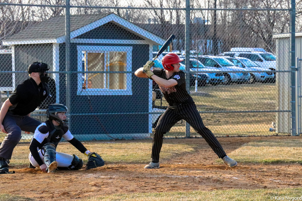 boy playing baseball