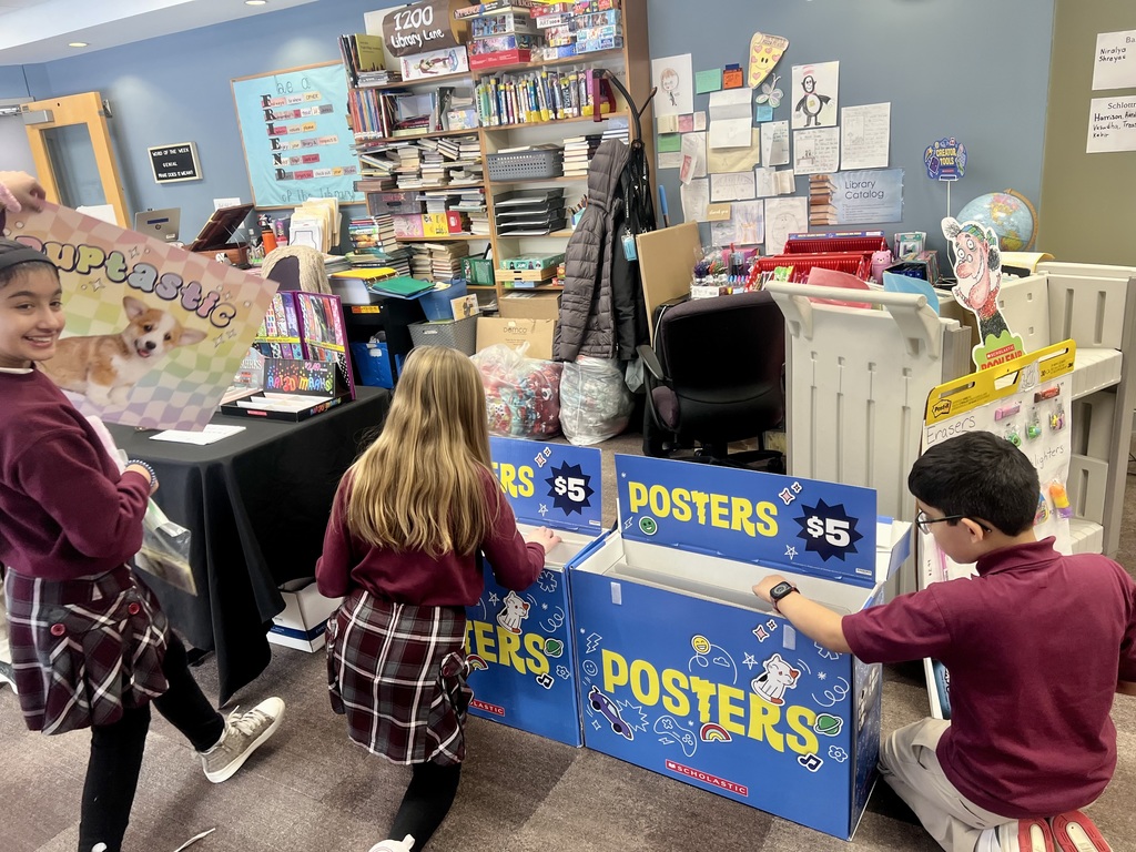 students looking at posters