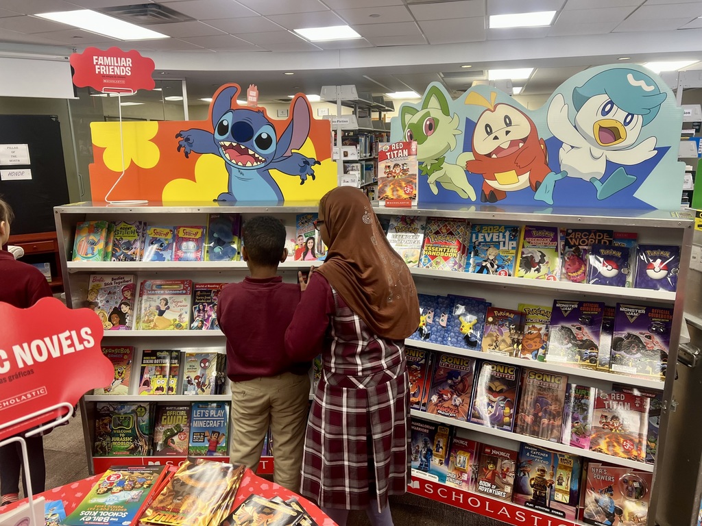 students shopping a book fair