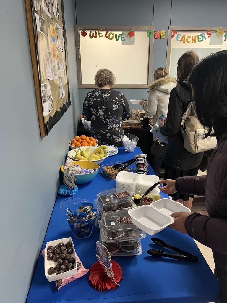 staff getting breakfast foods