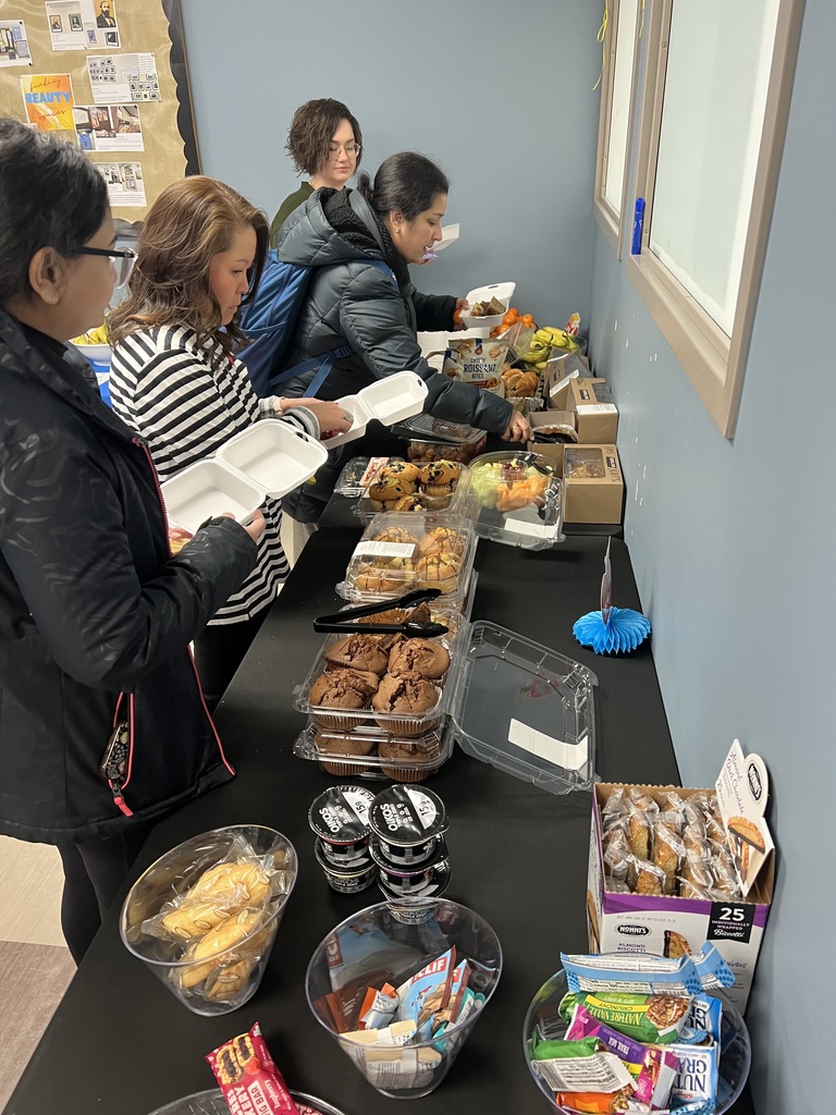 staff getting breakfast foods
