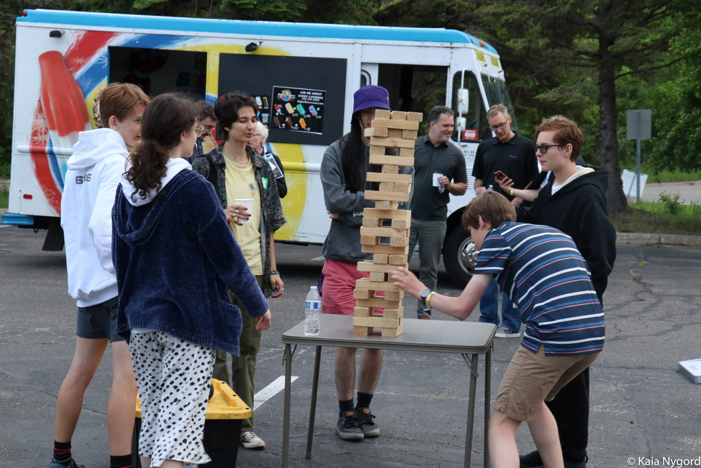 group of students playing jenga