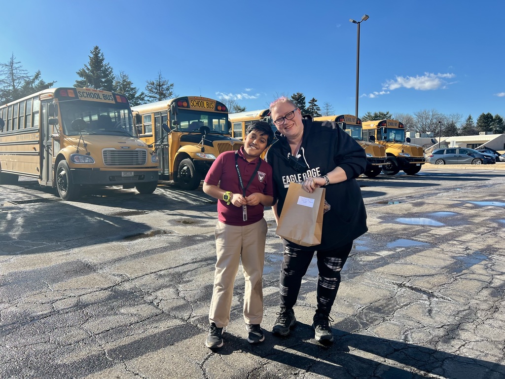 student with a bus driver