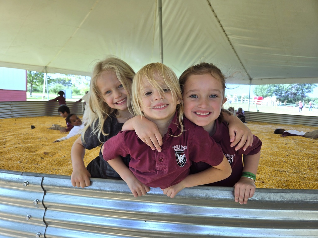 Kindergarten students in corn pit