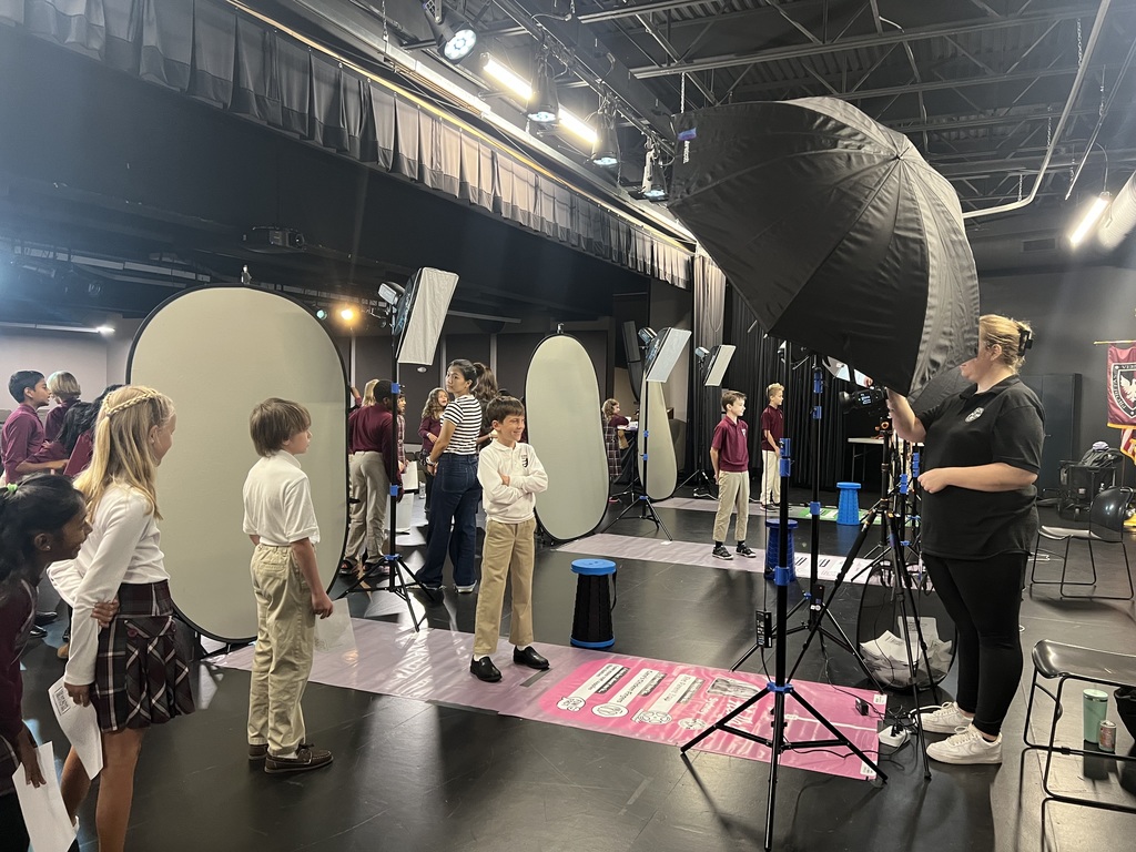Student posing for school portraits