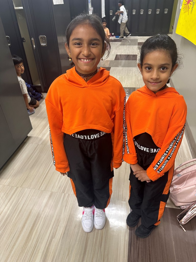 girls in orange and black