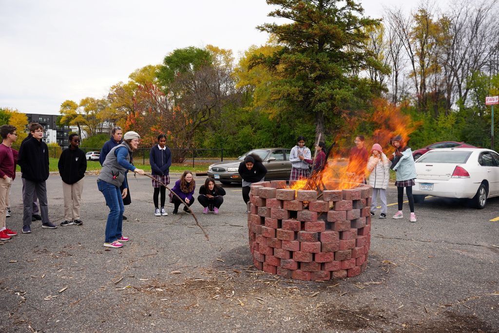 tending the pit fire