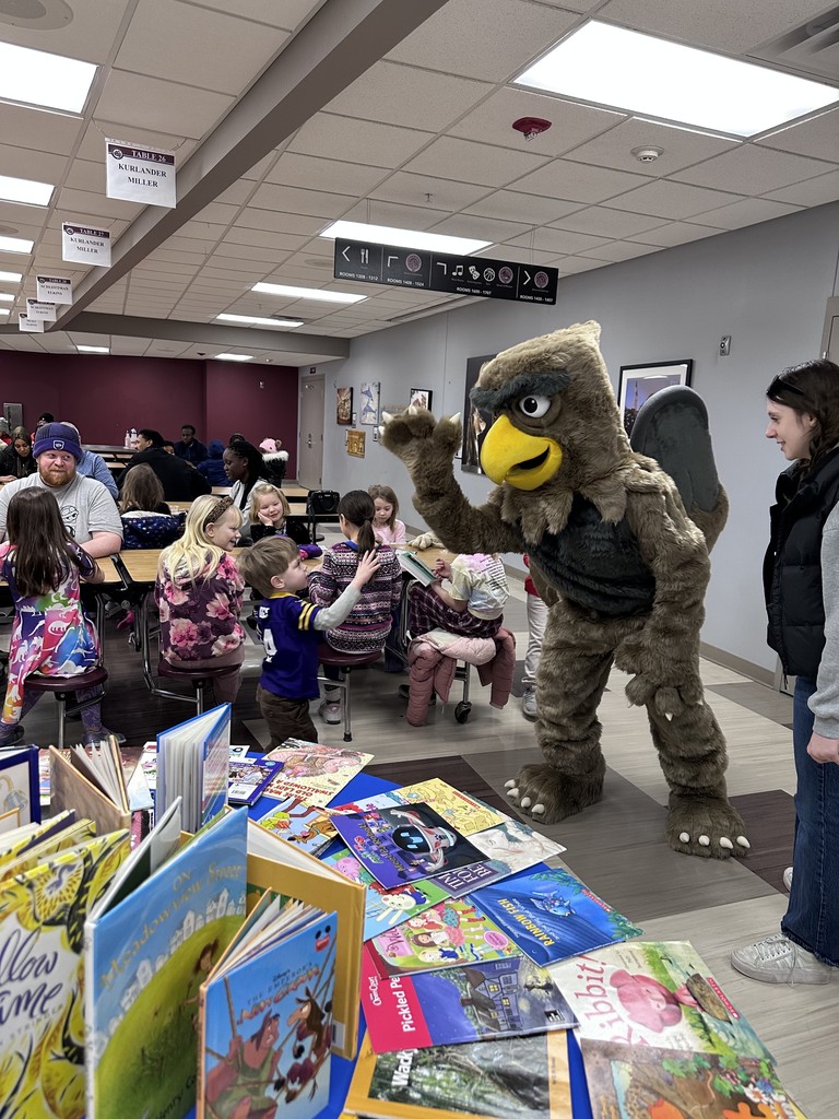 gus the gryphon with children