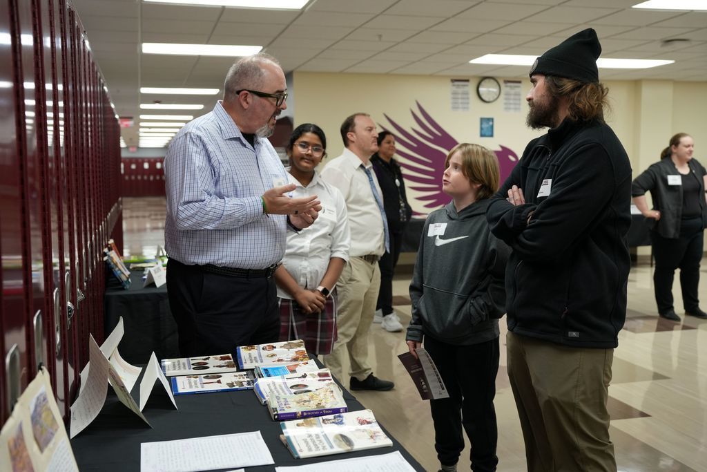 teacher talking to family
