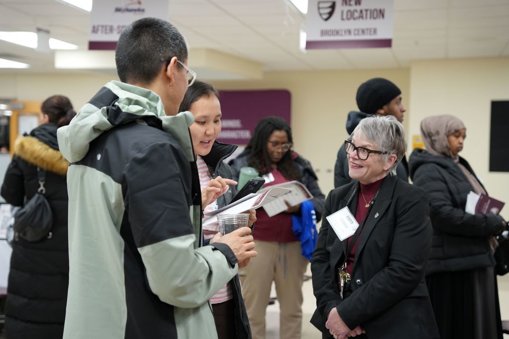 parents with staff member