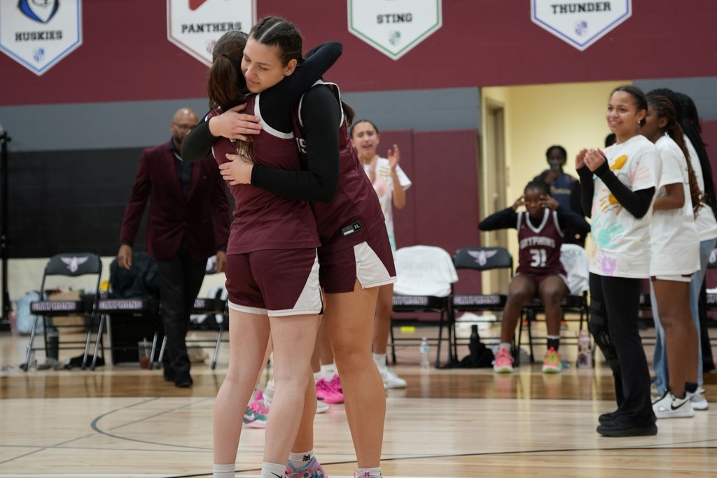 basketball girls hugging