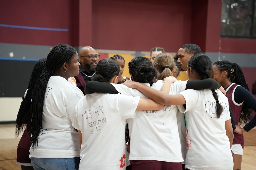 basketball girls hugging