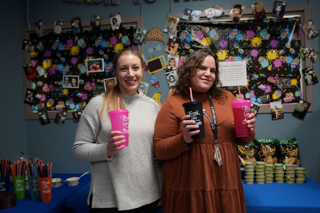 staff members with cups