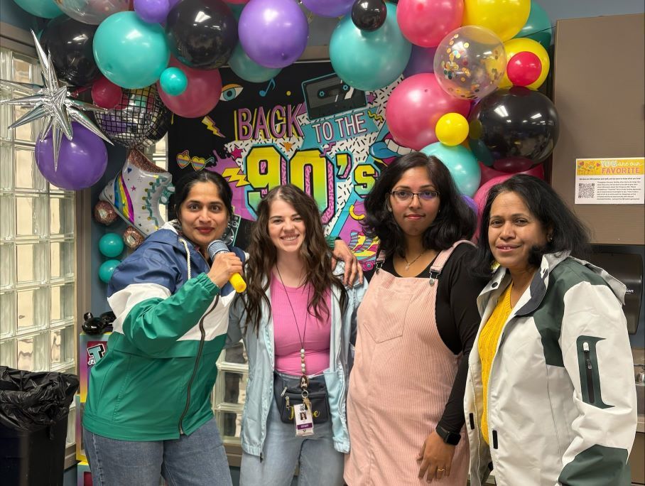 staff members in windbreakers
