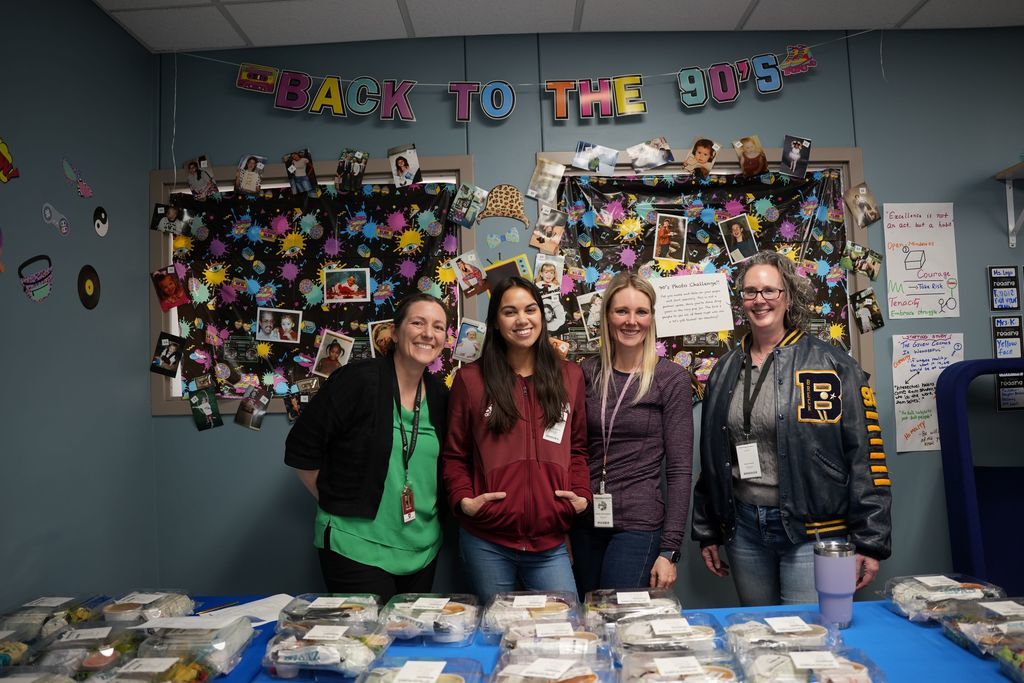 PTO members with table of food