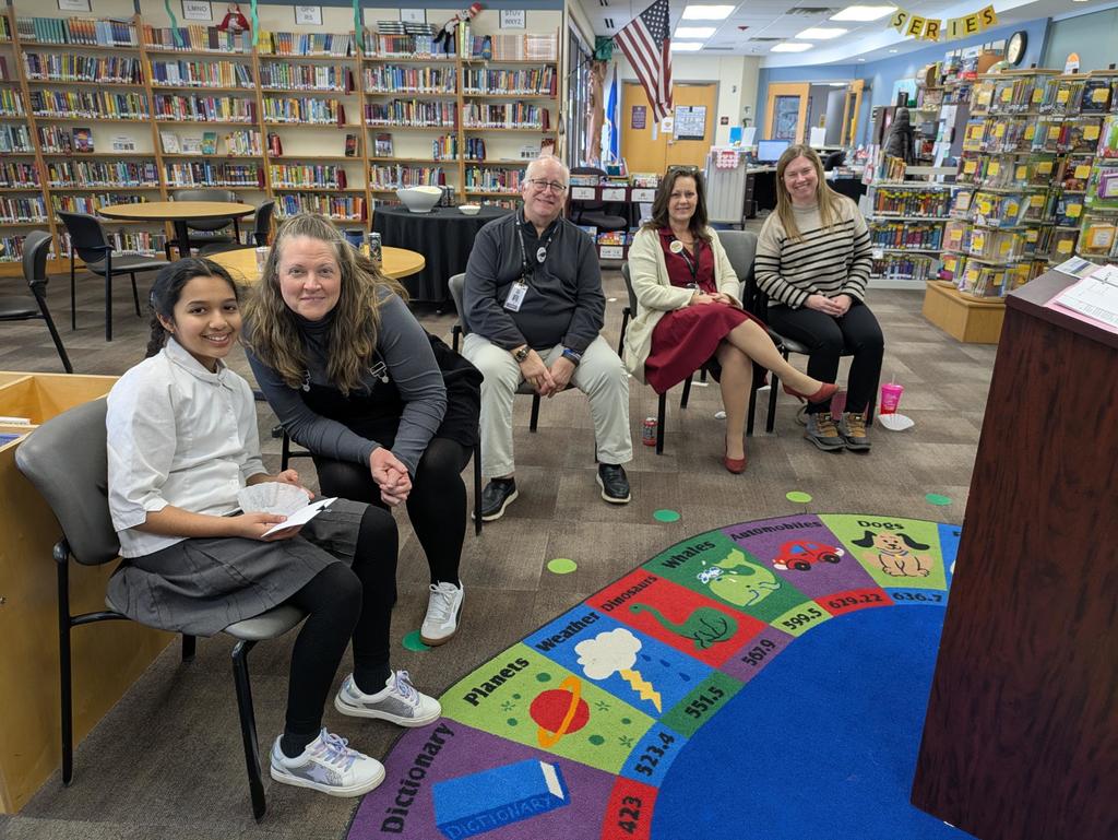 Itisha with teachers