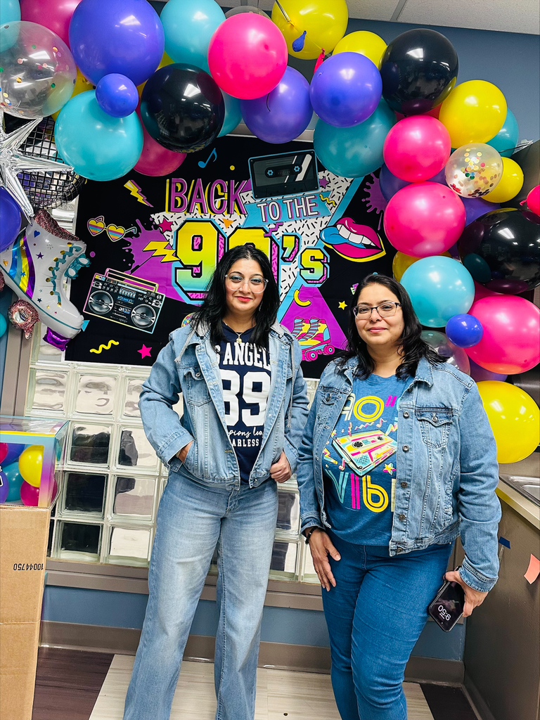 staff dressed in 90s wear