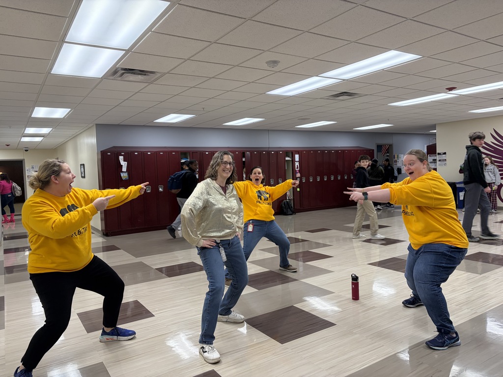 staff members recreating spiderman meme