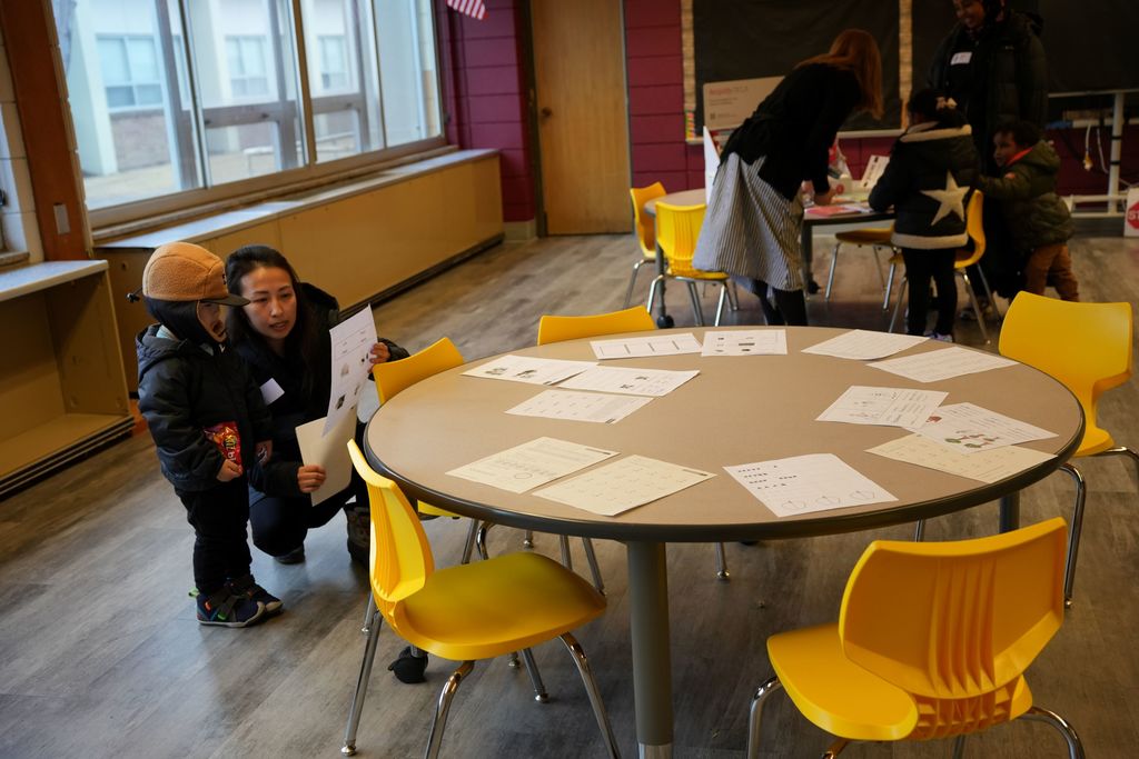 parent and child in kindergarten classroom