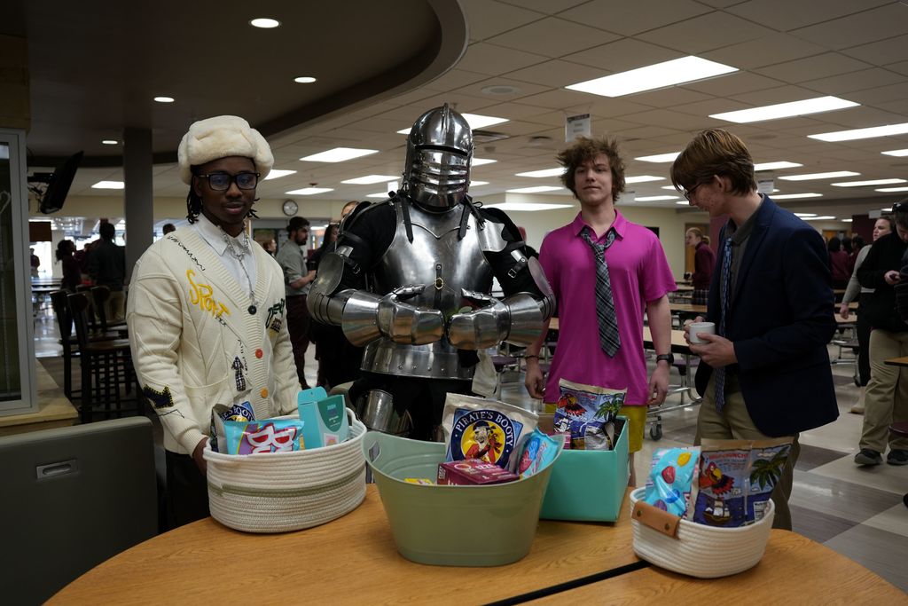 winners posing with gifts