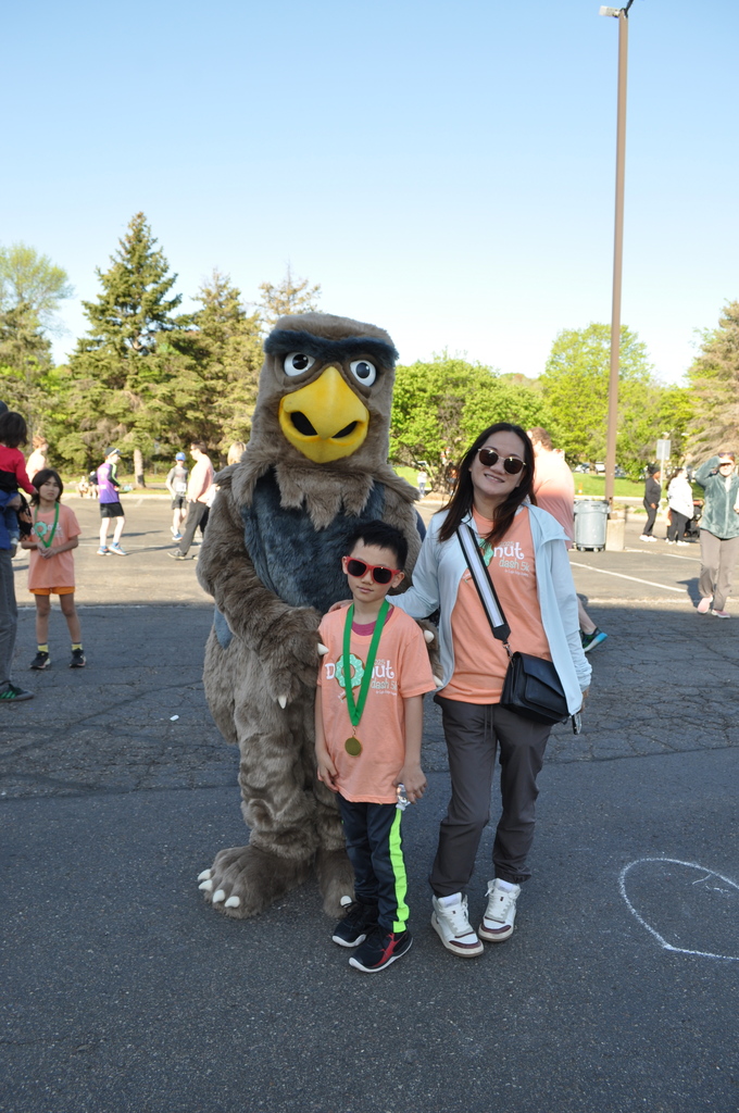 family with mascot