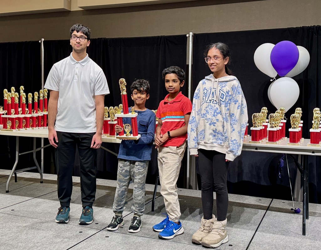 chess students with trophy