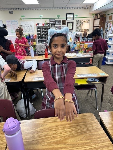 student with bracelets