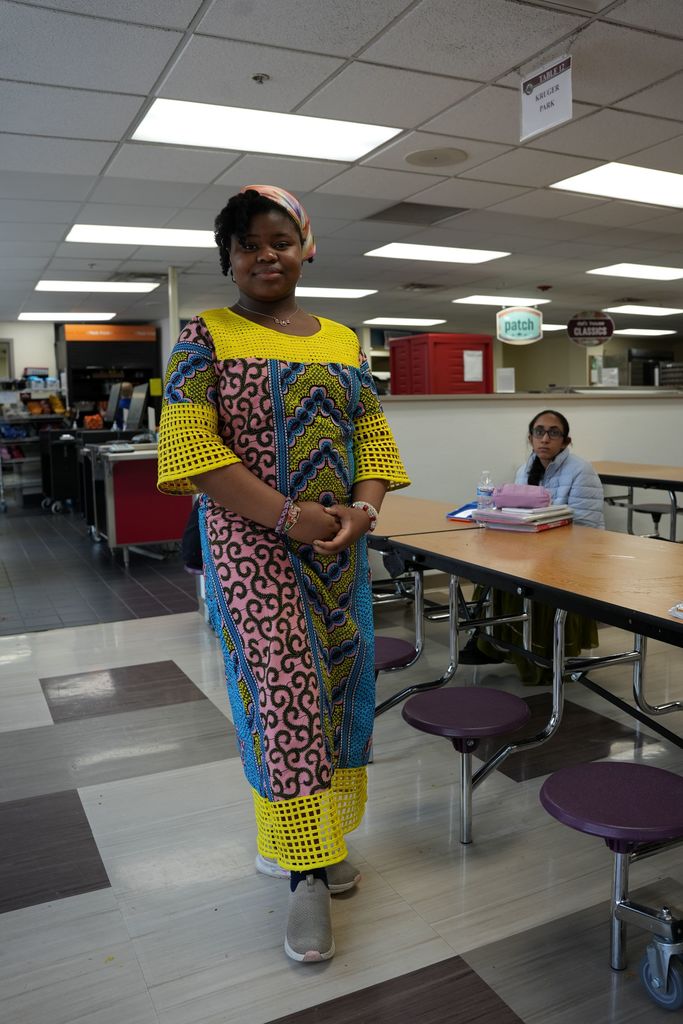 student in cultural wear