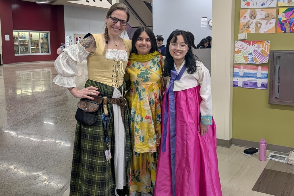 staff and students in cultural wear