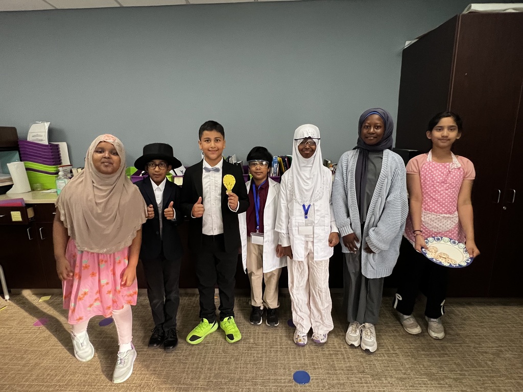 students in historical character costumes