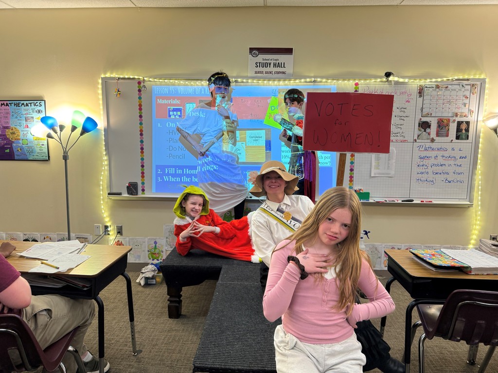 students in historical character costumes