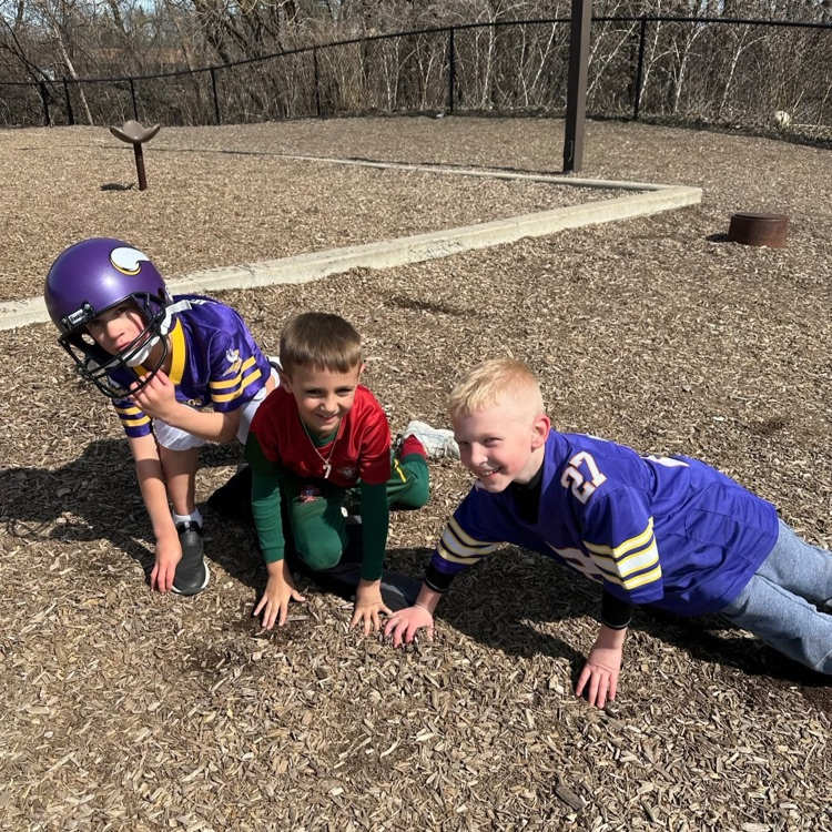 students dressed up as football players
