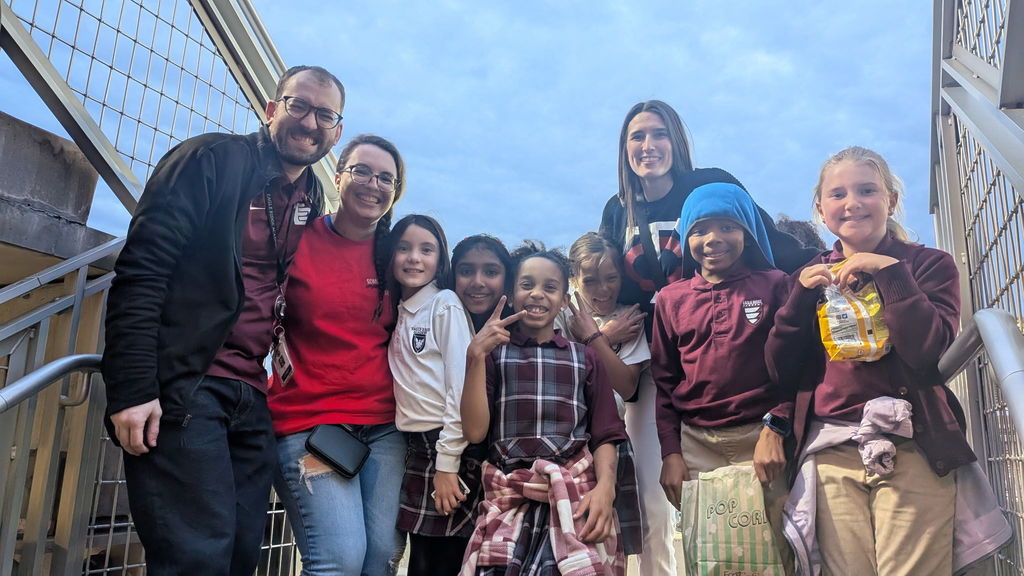 students and staff at Target Field