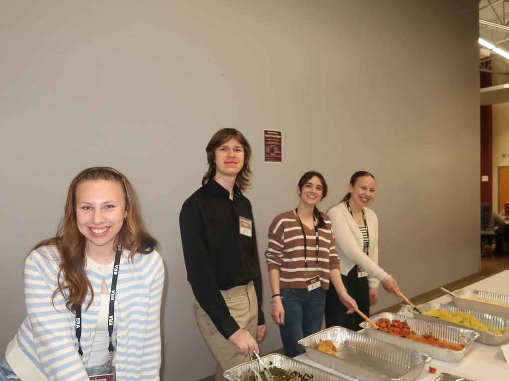 students serving food